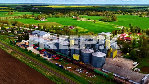 Agriculture harvest silo storage industrial holding area cerea corn grain, aerial | Premium Stock Video Footage
