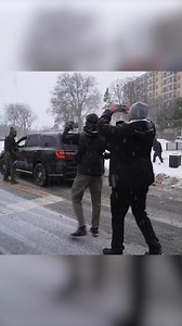 Federal agents used pepper spray to push through an angry crowd that blocked their vehicles as they checked identifications in a heavily Somali neighborhood of Minneapolis. | New York Post