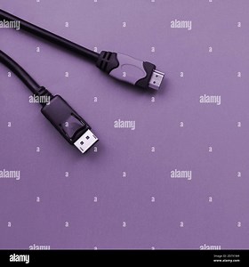 Audio video HDMI computer cable plug and 20-pin male DisplayPort gold plated connector for a flawless connection on a purple background Stock Photo - Alamy