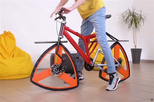 Inventor Builds Strange Bicycle with Triangle Wheels