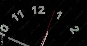 Timelapse or time lapse of clock on black background and movement of clock hands. Royalty high-quality 4k stock video footage time lapse clock with three arrow white hands moving too fast to one hour