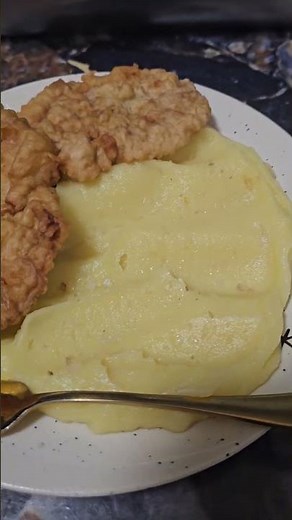 Pork tenderloin schnitzel with mashed potatoes