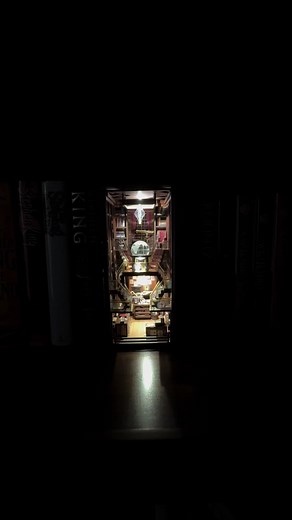 Step into the Beyond Library book nook by MiniCity! I’m in love with the globe and chandelier details. I love the way the nooks have an aesthetic that makes you feel like you could step right in and select a book to read. #BecauseAllTheBooks #Mini #Bookshelf #DIY #Books