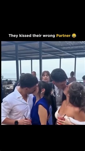 Dark Videos on Instagram: "The post shows a brief, awkward moment where two couples lean in at the same time and end up kissing the wrong partners, creating instant confusion about whether it was accidental or very poorly timed coordination. The camera captures the split second where realization sets in, followed by laughter and stunned reactions from everyone involved. What makes the clip work is the ambiguity — it’s unclear if the mix-up was intentional, misjudged, or simply the result of ever