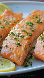 Dinner just got easier and tastier with this foolproof baked salmon recipe! RECIPE: https://natashaskitchen.com/baked-salmon-with-garlic-and-dijon/ | NatashasKitchen.com