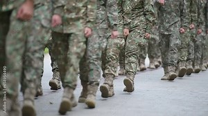 Soldiers in marching formation during military recruitment