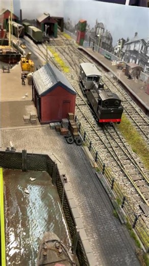 Steaming engine at the Festival of Railway Modelling.