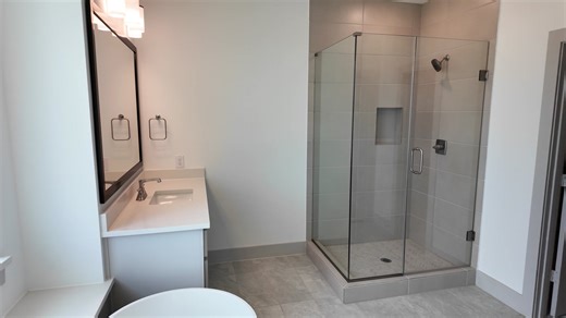 Do you desire a brand new construction home but don't want to wait 8-10 months to build from scratch? You're in luck! We have move-in ready homes that can close in as little as 3 weeks in our brand new community, The Trails at Cottonwood Creek, in Rowlett, TX. Check out this stunning move-in ready home, offering 6 bedrooms, 4 bathrooms, and a 2-car garage within 3,765 square feet of luxury living. Step into a world of elegance with soaring ceilings and a modern fireplace in the expansive family 