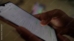 Smartphone message scrolling a person by hand video footage