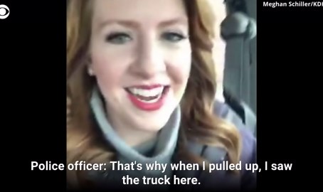 Cop responds to 911 call about a "crazy lady" to find reporter doing her job