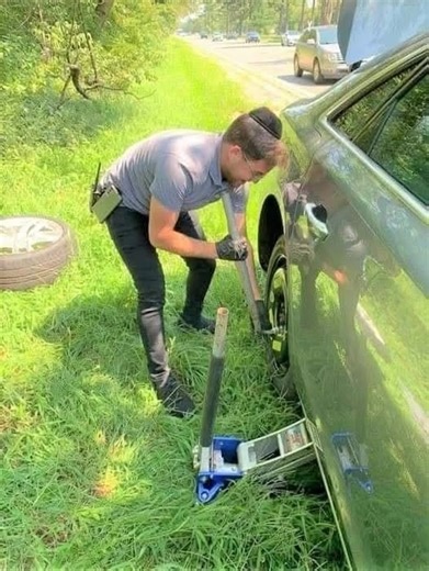 "Ruby and I were on the Southern State Parkway when it became obvious we had a flat tire. There's no shoulder on the side of that highway, so I pulled off onto the grass, and, almost immediately, a black Jeep pulled off the highway in front of us, just as I was looking for the phone number for AAA. A young man wearing a yarmulke stepped out of the Jeep into the 96 degree heat and walked over to the passenger side window of my car. He said he had lots of tools in his car and could change my tire 