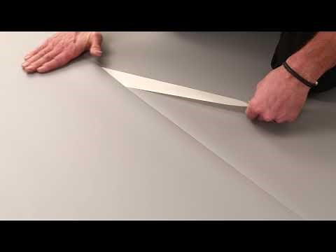 Installation of Harlequin Vinyl performance surface using double sided tape