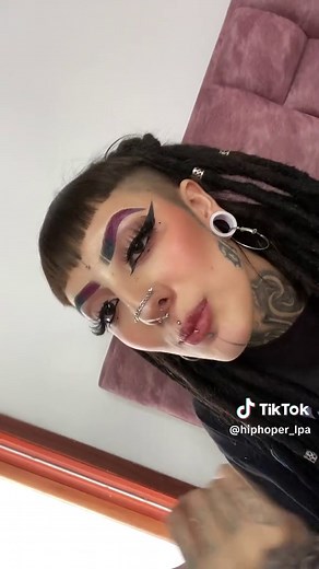 Exploring Unique Styles with Dreadlocks and Tattoos