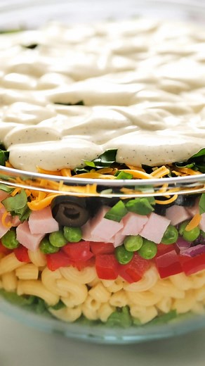 This… Layered Salad for Easter brunch. 🌸🐥🐰 Make ahead, toss & serve! Tap the recipe LINK in bio https://reluctantentertainer.com/ham-peas-pasta-salad/ #layeredsalad #eastersalad #reluctantentertainer #ᴇᴀsᴛᴇʀbrunch #pastasalad | Reluctant Entertainer