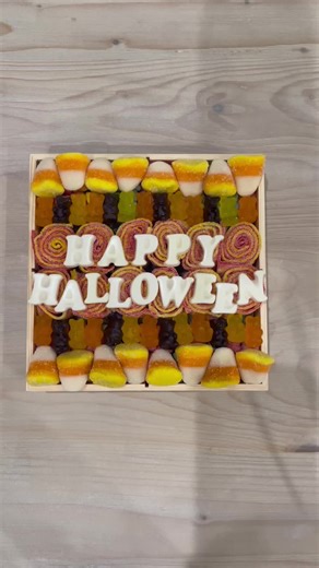 Order this for your Halloween parties! #halloween #party #candy #candyboard #holiday #cheeseboard #candycharcuterieboard #happyhalloween #halloweenideas #halloweenparty