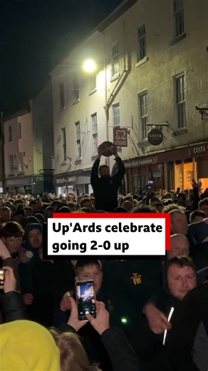 "Put the Champagne on ice" 🍾 Up'Ards player Josh Redfern was carried back through Ashbourne after he goaled the ball to put his side 2-0 up in the Royal Shrovetide Football. Read more at the link in the comments. | BBC Derby