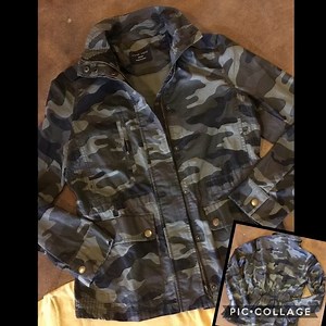 Camo light weight jacket has elastic back waistline. It’s a must for many occasions. Shop now for fall!! Going quick. #jjsdesigns #jjsdesignsonline #ootd #boutiqueshopping #facebook. | JJ's Designs