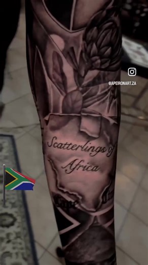 Colorful South African Sleeve Tattoo by Shay