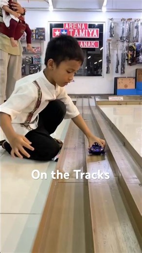 playing Tamiya cars on the track