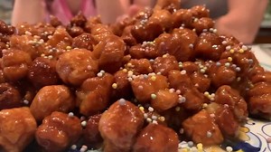 Struffoli - Neapolitan Christmas Honey Balls. A must for me during the holidays. Who’s had them or making them this Christmas. 🙋🏻‍♂️🙋🏻‍♀️ Spread the Christmas love this season and share the recipe. Full Struffoli Recipe Below. #Struffoli #HoneyBalls #Christmas #Tradition Struffoli Recipe: For the dough: 2 cup Flour, all purpose extra for dusting 1 orange, zested and 1/2 squeezed juice 2 lemon, zest 4 eggs 2 tbsp white wine 1/2 tsp salt 1/2 tsp sugar 1 tbsp peanut oil For Frying: Peanut oil f