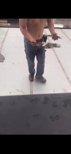 Carefully Removing a Broken Windshield in Outdoor Setting