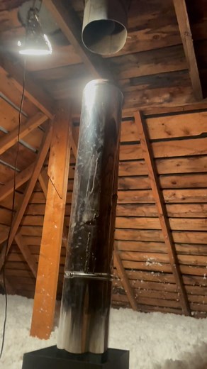 Well I got the ceiling support box anchored in and have attached two sections of the silver, insulated, double wall chimney pipe to pass through the attic and roof. #chimneysweep #solidwork #dirtyjobs #goodjob #marypoppins #womenatwork #chimney #woodstove #goodvibes #goodluck | Ella Wren Running-rabbit