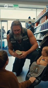 The security guard tackled the sobbing mother at the grocery store exit, twisting her arm behind her back over a stolen can of baby formula. Everyone stood around filming with their phones as the woman begged, screaming that her baby was starving, but the guard just tightened his grip, acting like he’d caught a bank robber. Then the automatic doors slid open and the sunlight was blocked by a human eclipse—a biker so large he had to duck to enter, his leather vest straining against muscles that l