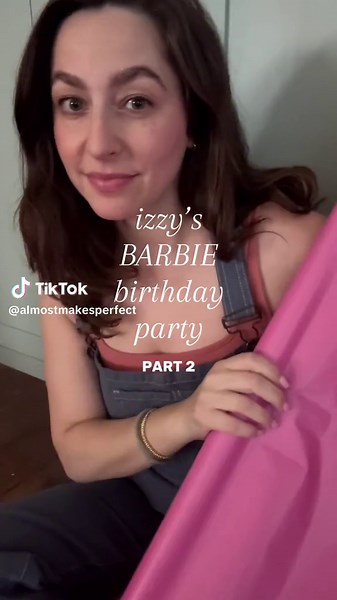 IZZY’S BARBIE PARTY - PART 2! #ad we’ve built the giant barbie box (well ok, izzy size) and obviously it needed her NAME to be totally custom! so i used my trusty @cricut to print it on vinyl and stuck it onto pink foam core from the dollar store. i’m obsessed! next, i used my @cricut to make the favor boxes, i got these cute pink boxes and printed all the kids names out in a barbie font, i transferred each name to the boxes - and AGAIN I AM OBSESSED!!!! ps if you’re curious, my machine is the @