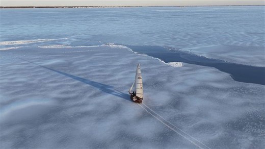 'Iceboat' glides across frozen New York lagoon on metal runners