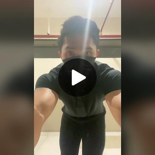 Showcasing Strength: Male Model Flexing Routine