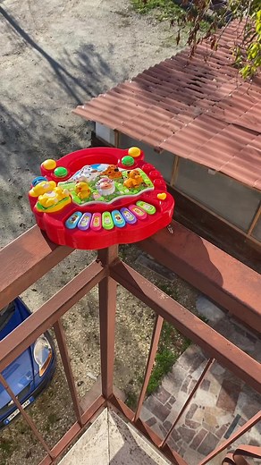 Colorful Toy Piano with Animal Figures in Action