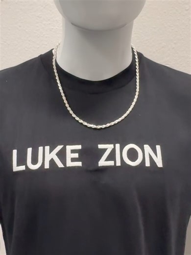 4mm Rope Chain at 22 Inches | Everyday Silver Rope Fit on Mannequin This video shows a 4mm Rope chain at 22 inches on a mannequin, highlighting how it settles naturally on the upper chest. The medium thickness gives the rope a visible texture while staying clean and wearable. Made from solid 925 sterling silver and crafted in Italy, this chain offers versatility and balance. The 22-inch length is ideal for those who want a relaxed fit without going too long. Is 22 inches your go-to length for da