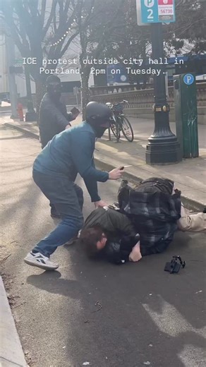 John Collins on Instagram: "I was at city hall today to listen to the city council meeting on Homeless and affordable housing. Meanwhile outside Anti ICE protesters and MAGA are fighting each other. Portland Police were on scenes to diffuse the situation. #portland #ice"