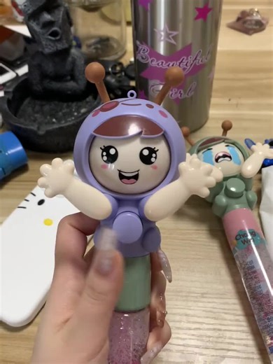 Colorful Alien Figurines: Playful Interactions Revealed