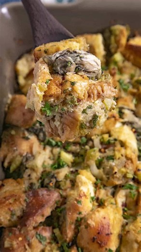 Oyster dressing is a classic savory Southern dish of oysters and seasoned bread, often served as a side dish during Christmas and other holiday meals. >> Comment “RECIPE" and I'll send this recipe straight to your DMs! 🥳 GET THE RECIPE ⬇️ https://www.chilipeppermadness.com/recipes/oyster-dressing/ Ingredients: 24 ounce loaf of soft white bread cubed (I love French bread for this) 8 tablespoons butter 1 medium onion chopped 2 jalapeno peppers chopped (use bell pepper for less spicy) 2 stalks cel