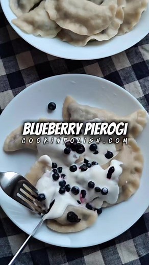 Blueberry Pierogi – A Taste of Polish Summer! 🇵🇱☀️ Soft homemade dumplings filled with sweet, juicy blueberries, served with sour cream and a sprinkle of sugar… Is there anything more nostalgic? This is the flavor of childhood summers in Poland — when your fingers were stained purple and the kitchen smelled like dough and sunshine. 👉 Full recipe: https://cookinpolish.com/blueberry-pierogi/ #BlueberryPierogi #PolishFood #PierogiLove #PolishSummer #CookinPolish #TasteOfHome #BabciasKitchen | Co