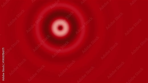 An intense red background features a luminous, pulsating circular glow that expands outwards from a central point, creating a captivating ripple effect. The vibrant crimson hues shift and deepen as th