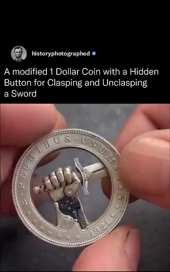 A US Silver dollar transformed into an engraved coin with a hidden button. Press it, and watch the sword clench and unclench in awe-inspiring motion! via: @romanbooteen Like history? Follow @historyphotographed 🌟 | History In Pictures