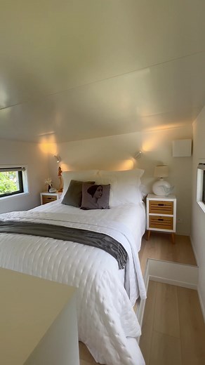 This may be the cutest little tiny home you’ve ever seen!! Our ‘TINY ONE’ – at 8m L x 3m W this is a lovely tiny home with one mezzanine bedroom. Featuring a high ceiling end lounge with a galley kitchen packed full of storage (including under the stairs) and a full size pantry leading through to a spacious bathroom with full size shower, laundry tower and back door. The stairs comfortably rise up the back wall of the home to the spacious bedroom with wardrobe and drawer storage. The perfect lit