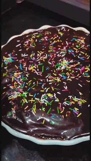 SHORT VIDEO OF CHOCOLATE CAKE WITH CHOCOLATE SYRUP AND SPRINKLES #CAKE #TASTY #COOKERY #CHOCOLATEY