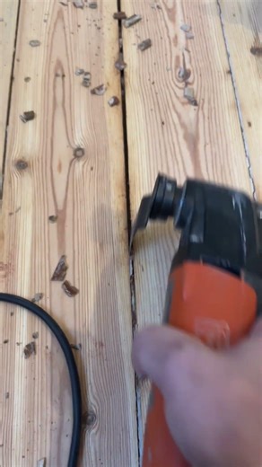 Cleaning 100-year-old floor gaps.