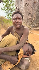 Hadzabe Tribe bushmen Chabba puts his brother Dudukwe to sleep with his lovely singing 🥰 | Hadzabe Tribe Adventure
