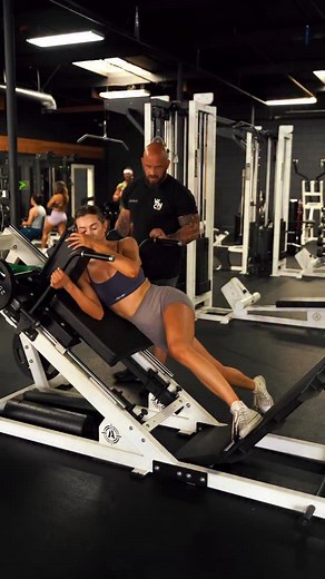 Single Leg Hack Squat This variation is going to put a lot of emphasis on the glutes by mimicking a deficit step back lunge | Andrew Taylor