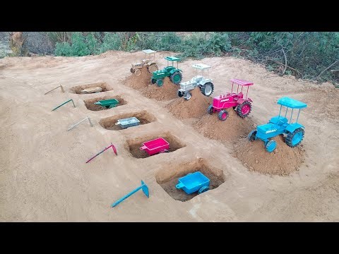 The tractor climbed over the mud and the trolley stood in the pit#360