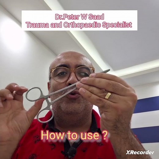 How to hold the Needle Holder