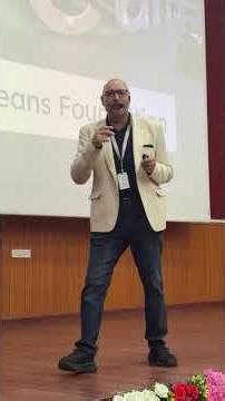 Doing the Ho Hum ! technique of getting attention from audience Presentation at Oriental University.