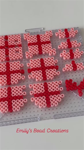 Emily | Perler bead crafts on Instagram: "My fuse bead gift box pattern is now available on Gumroad for just $1! 419 beads, 1 board, 1 adorable 3D present. 🎁 #perler #3dperler #3dperlerbeads #gift #happyholidays #fusebead #christmas #present #pattern #diy #crafty #christmascrafts #christmascraftsforkids #christmasishere #diychristmasdecor"