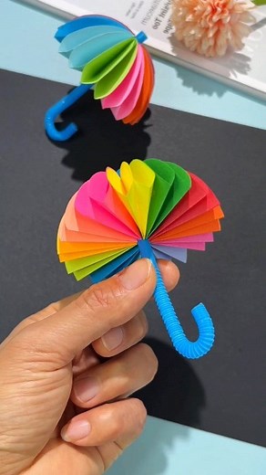 paper crafts creator on Instagram: "Title: "Vibrant Paper Umbrella: A Colorful DIY Project! 🌈☂️" Hashtags: #PaperCrafts #DIYUmbrella #CreativeKids #CraftyFun #ColorfulCrafts"