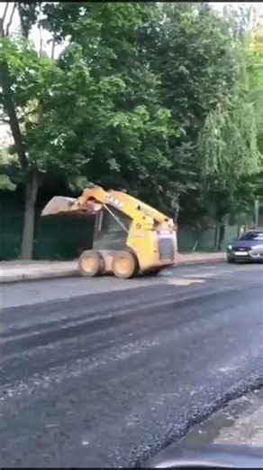 Skid-Steer Lifts Wheels in Epic Road Construction Stunt 🤯 🚧