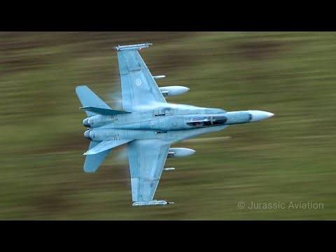 CANADIAN F-18 HORNETS BUZZ THROUGH MACH LOOP!